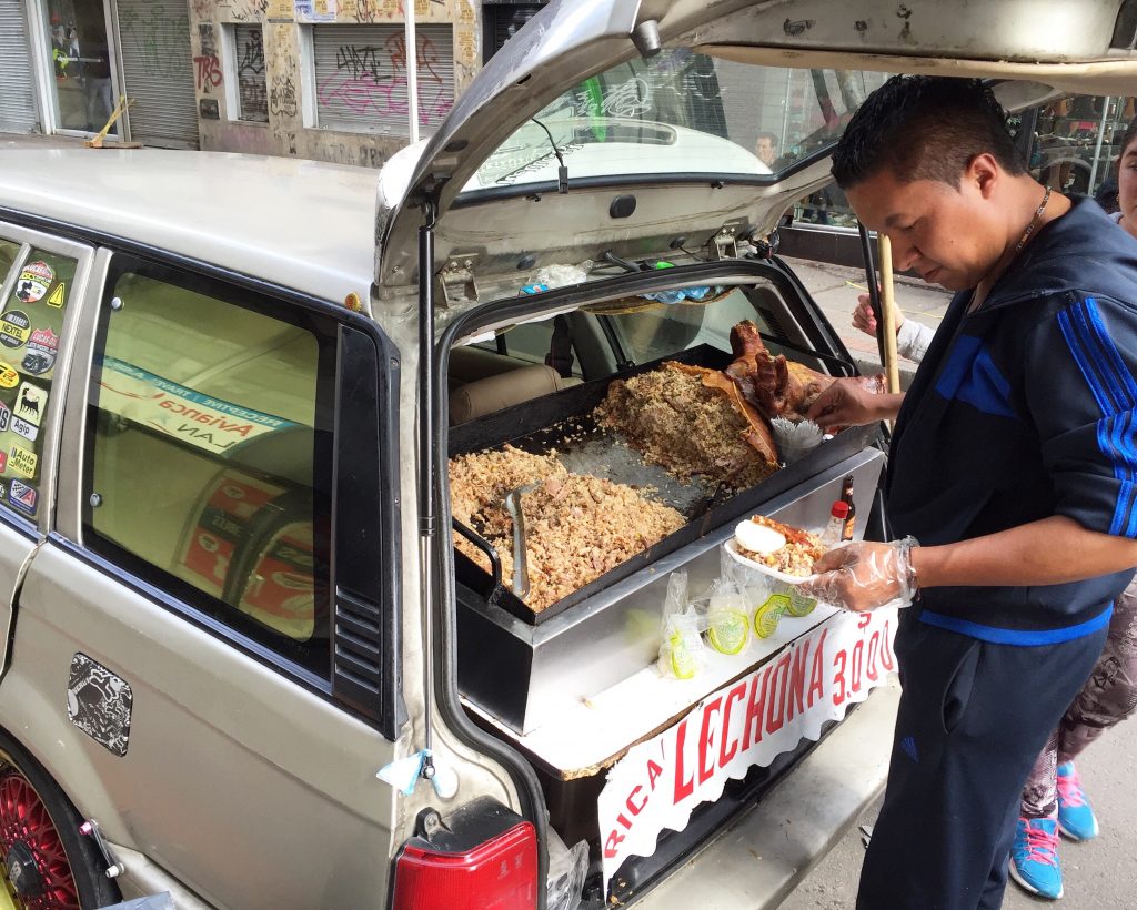 Roasted pig out of the back of a car!